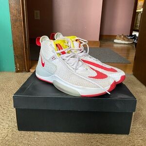 Nike White Hyperdunks with Red Swoosh and Yellow Tongue Accents